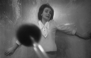 Barbara is pinned against the wall in fear during the Daleks' first appearance in Doctor Who on 21st December 1963