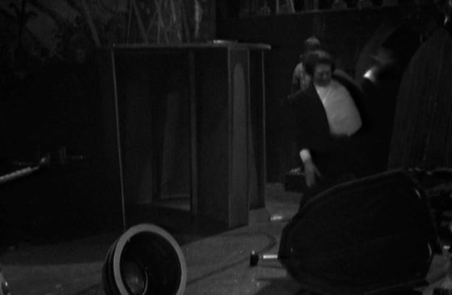 Frankenstein has hurled the Dalek to the floor and is now hitting it