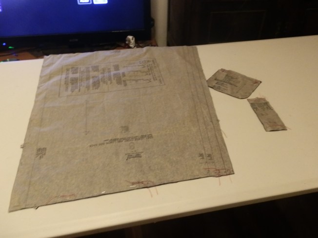 The first pieces of the Frock Coat to be cut out have tailor's tacks 